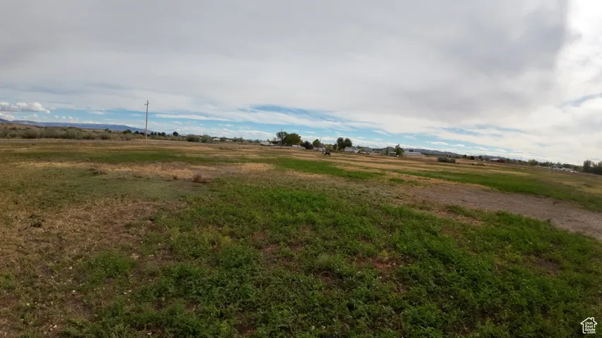 View of yard featuring a view of rural / pastoral area