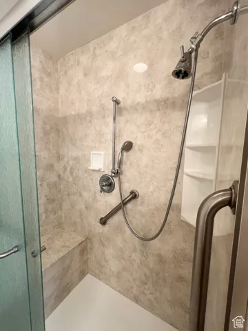 Basement Bathroom with walk in shower and 2 shower heads