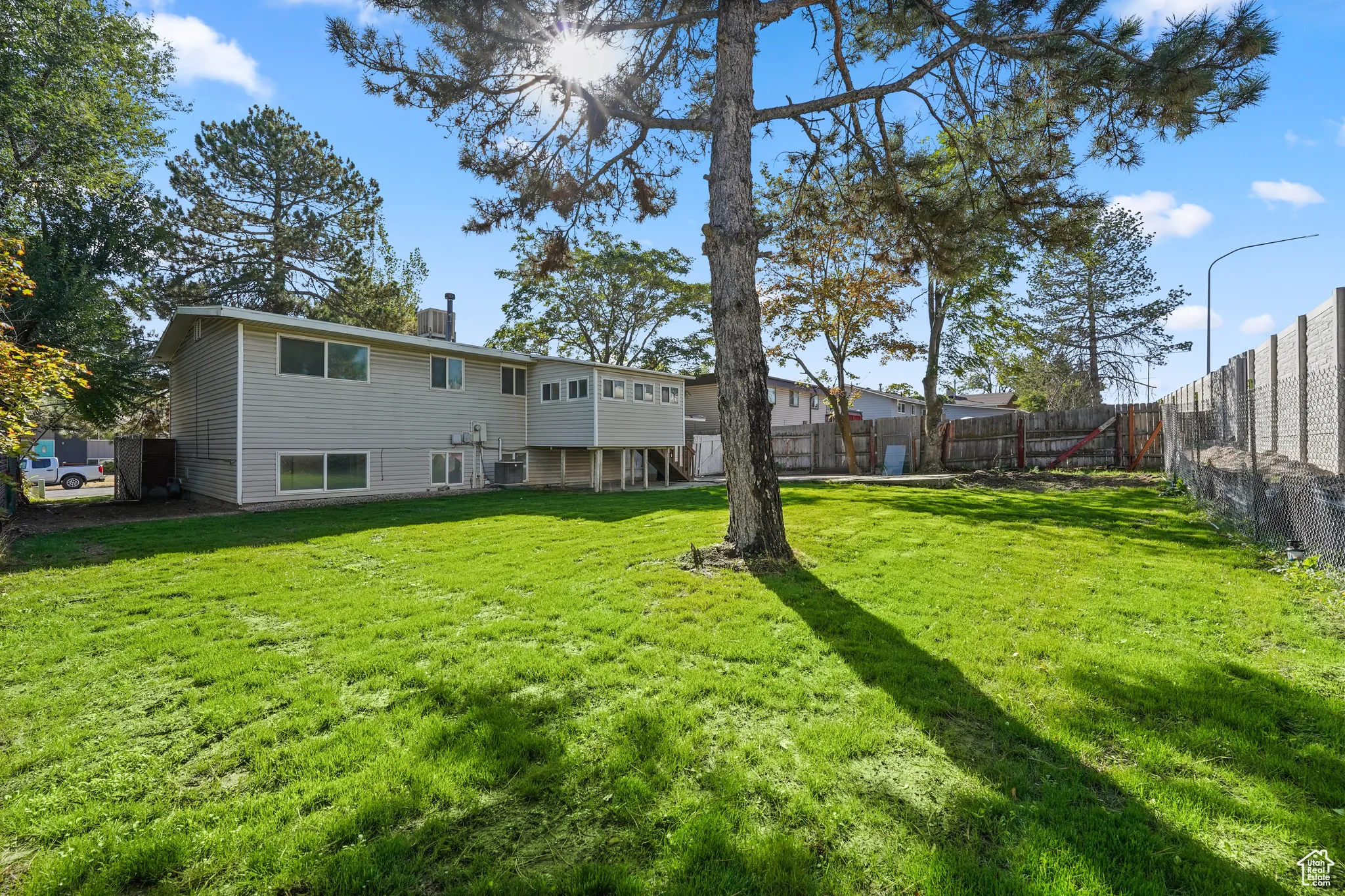 View of fenced backyard