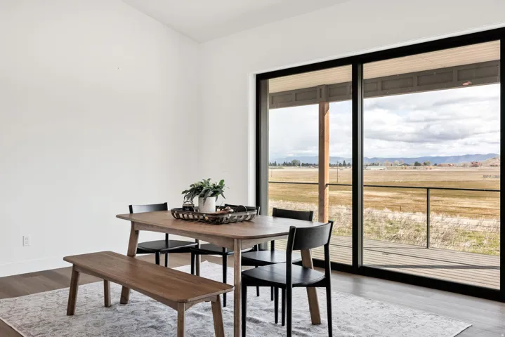 Dining space featuring light wood finished floors and baseboards