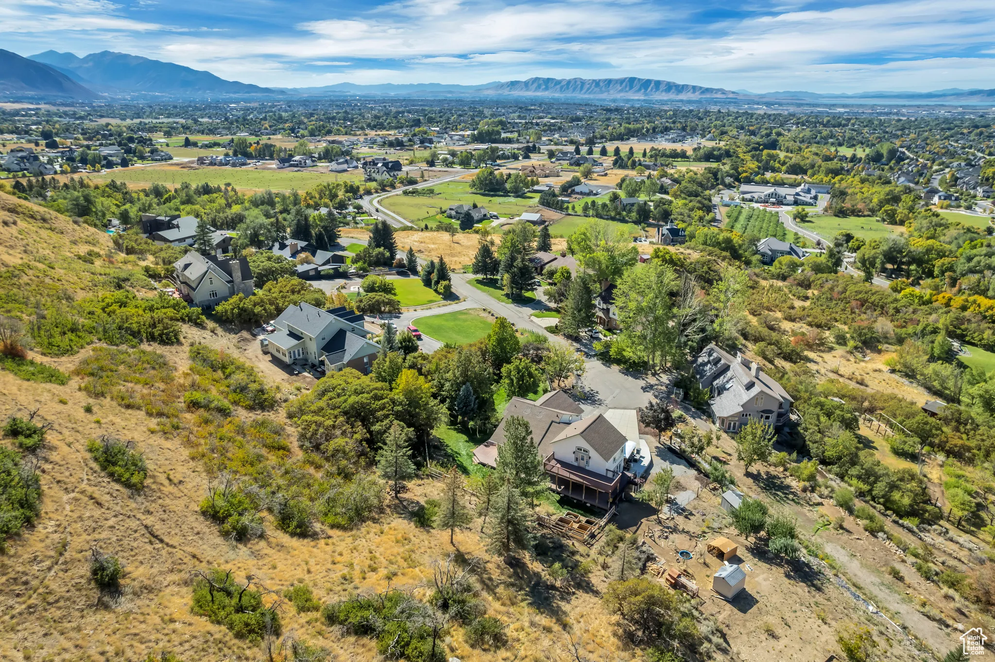 Aerial perspective of suburban area featuring mountains