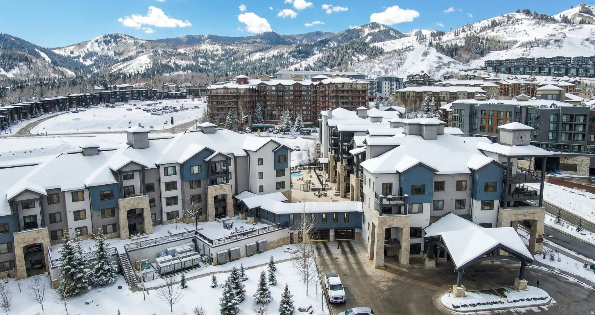 Snowy aerial view with a mountain view