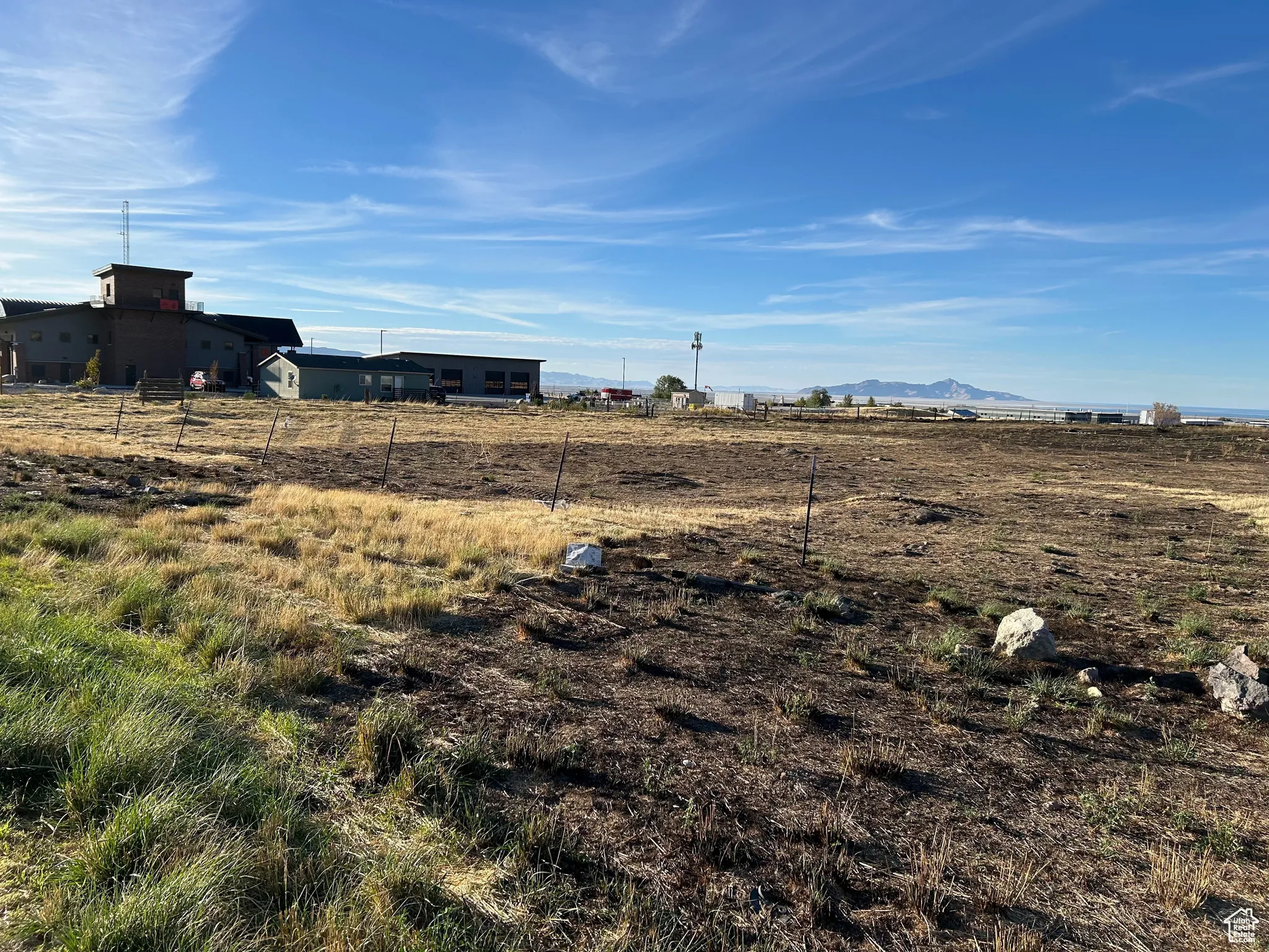 View of yard featuring a rural view and a mountain view