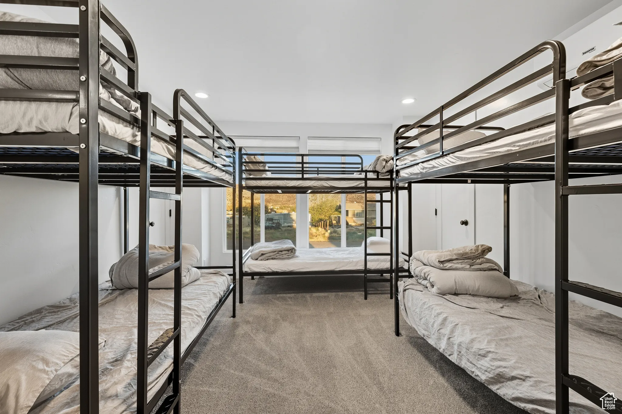 Bedroom with carpet flooring and recessed lighting