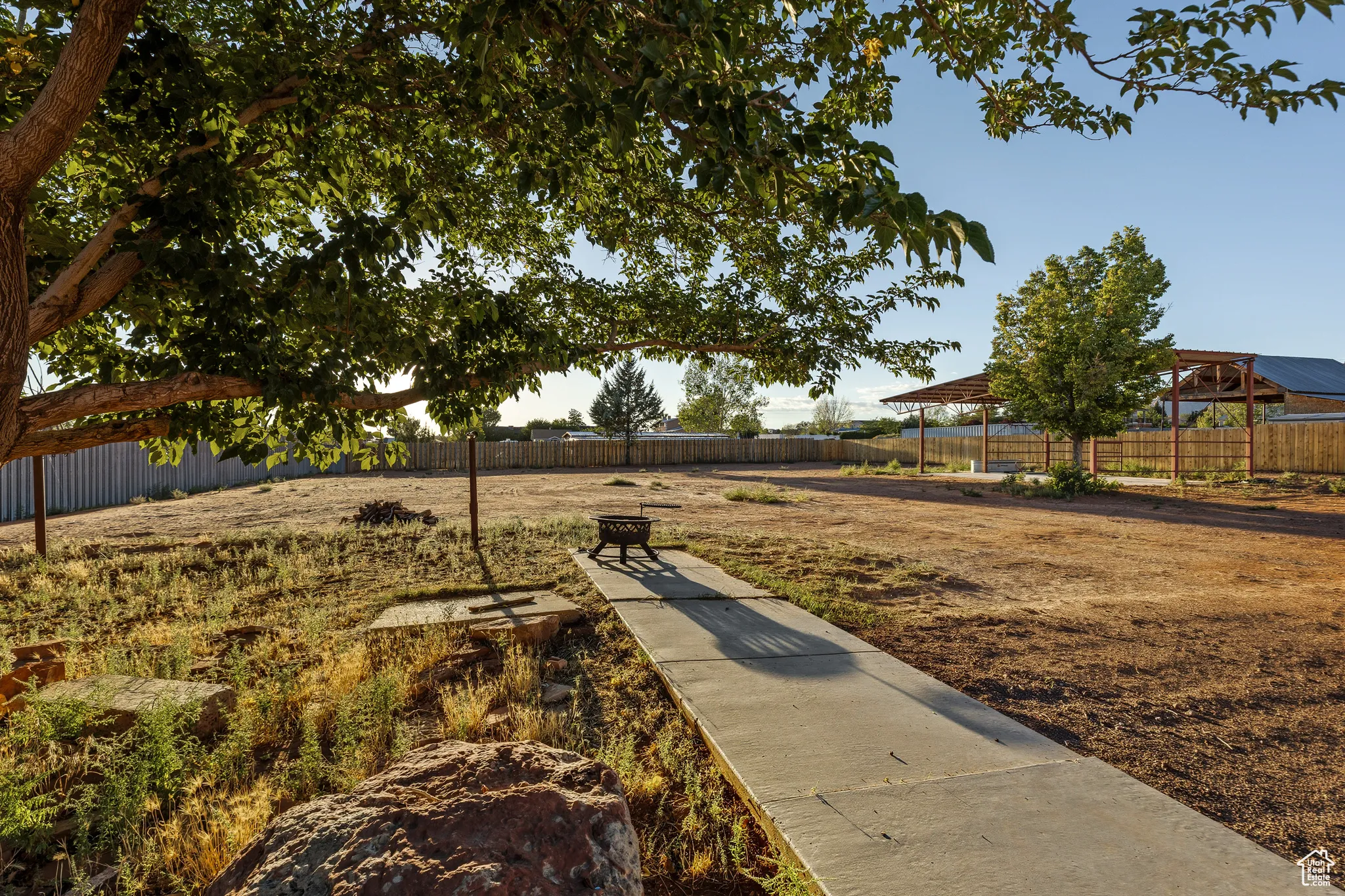 Surrounding community with a patio area