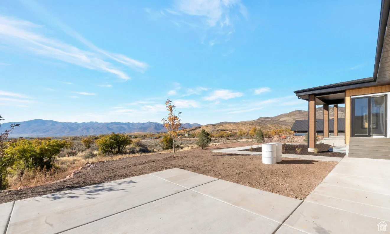 View of patio with a mountain view