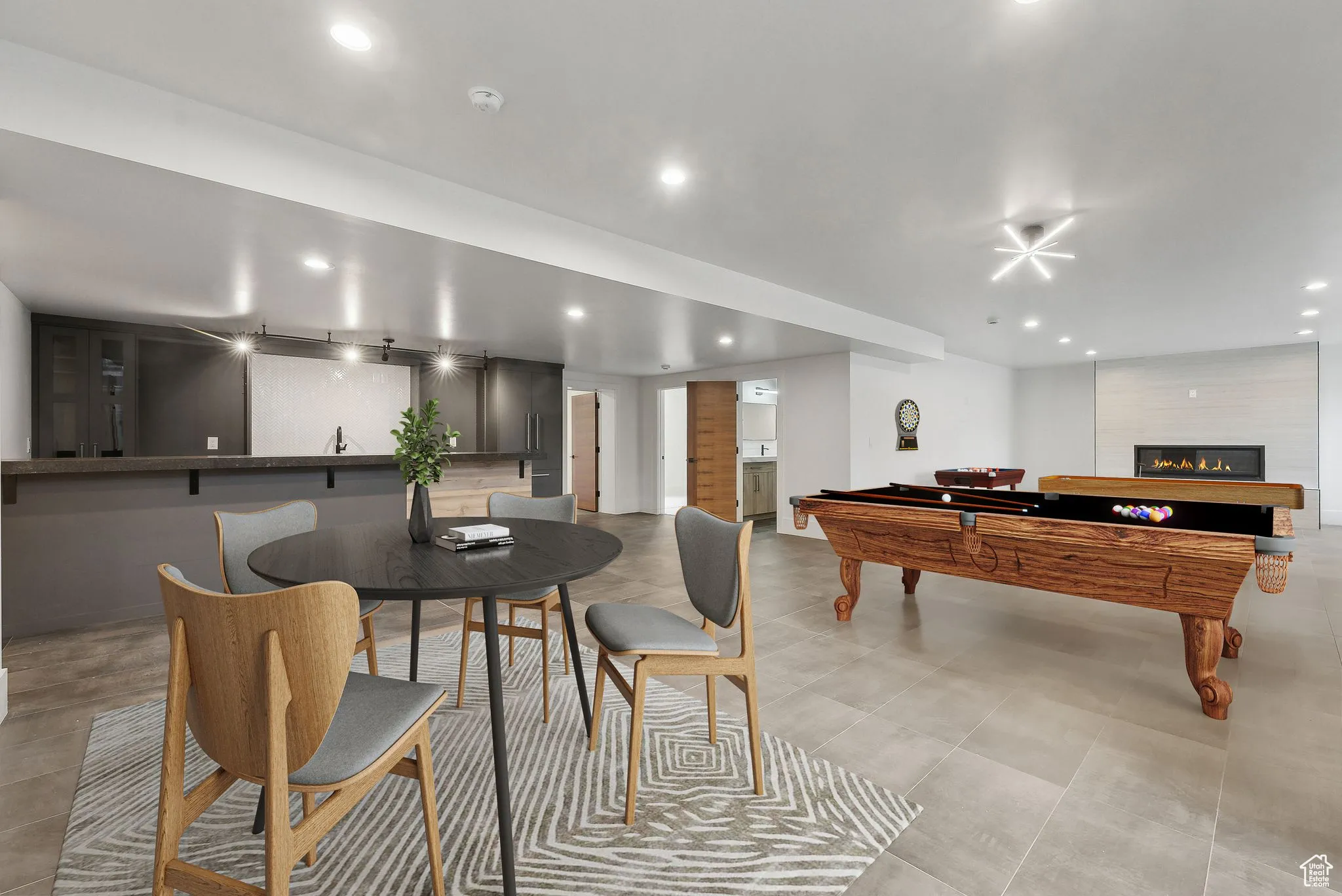 Recreation room featuring recessed lighting, a fireplace, and billiards