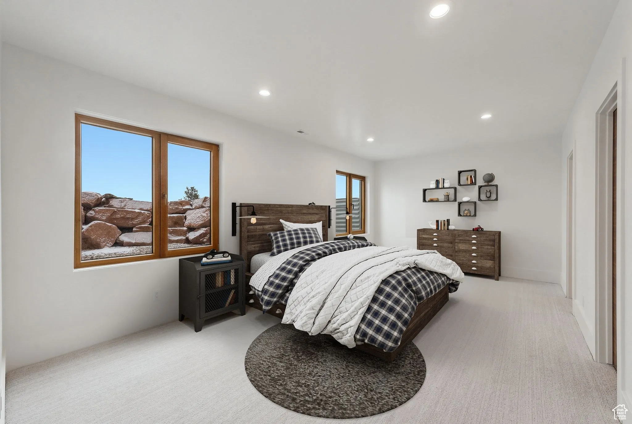 Bedroom with recessed lighting and light colored carpet