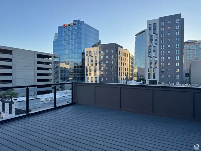 Wooden deck featuring a city view