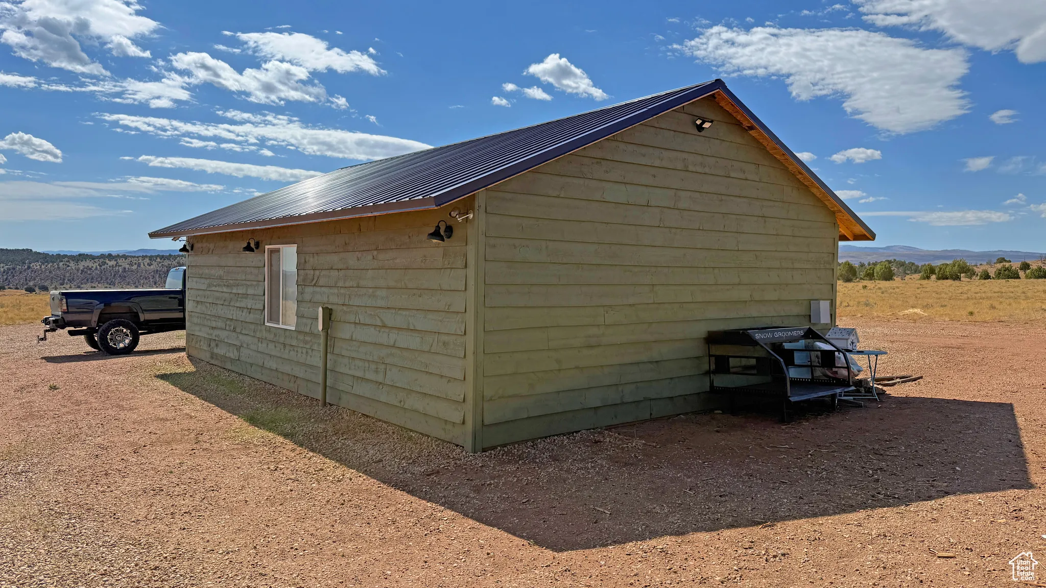 View of outbuilding featuring a mountain view