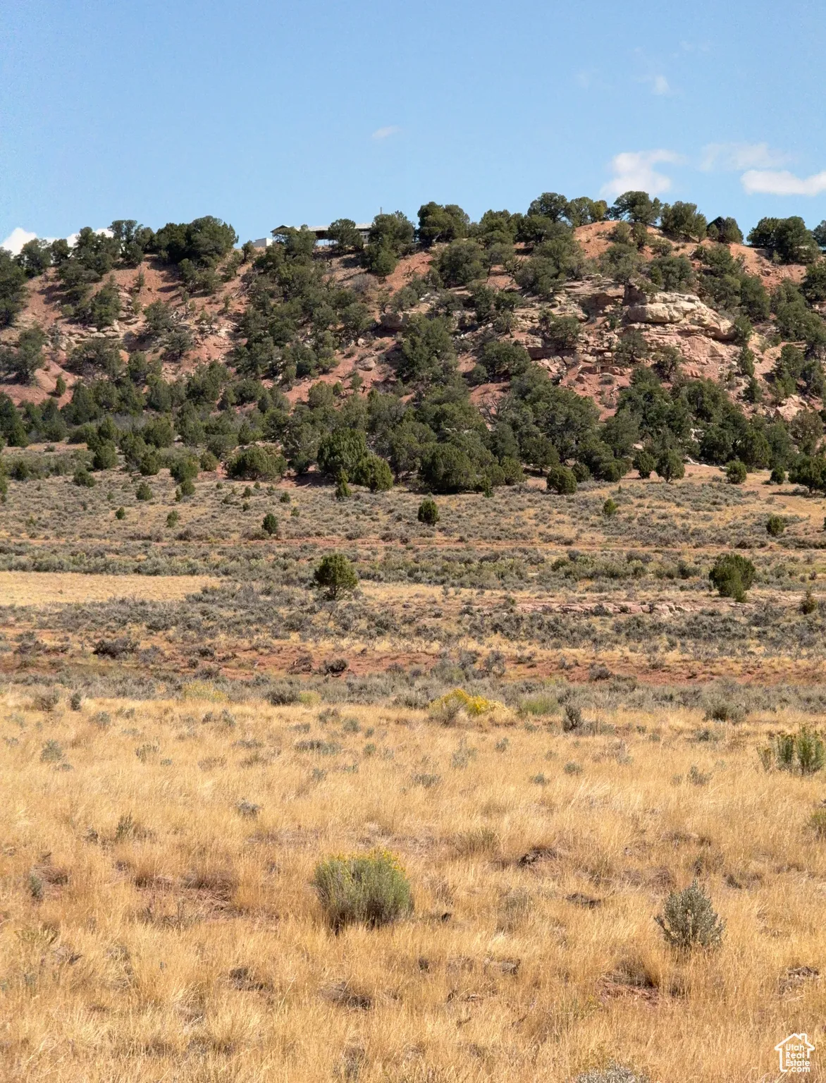 View of mountain background featuring rural landscape