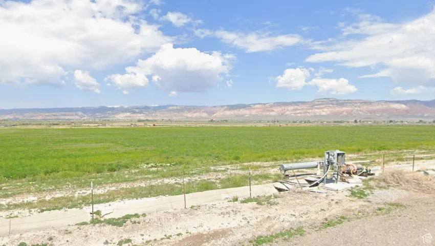 View of yard with a view of countryside and a mountain view