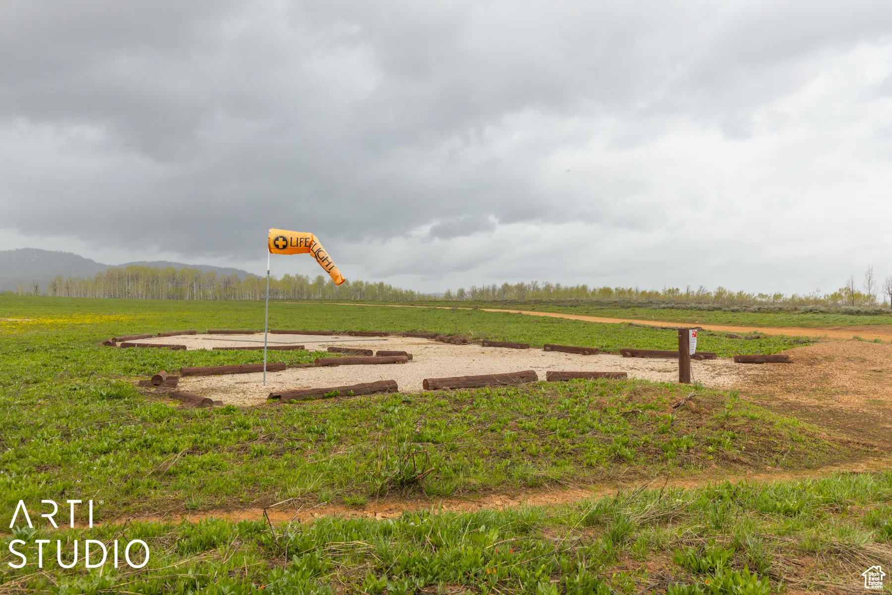 View of yard featuring a view of rural / pastoral area and a mountain view