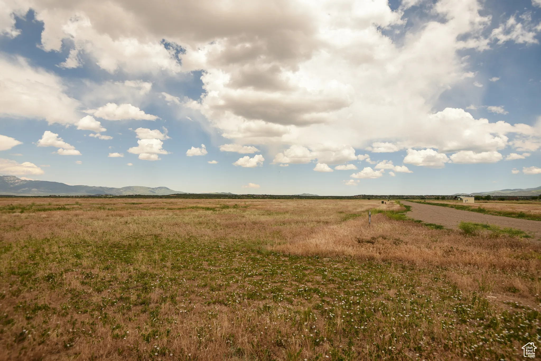 View of nature featuring rural landscape and a mountain backdrop