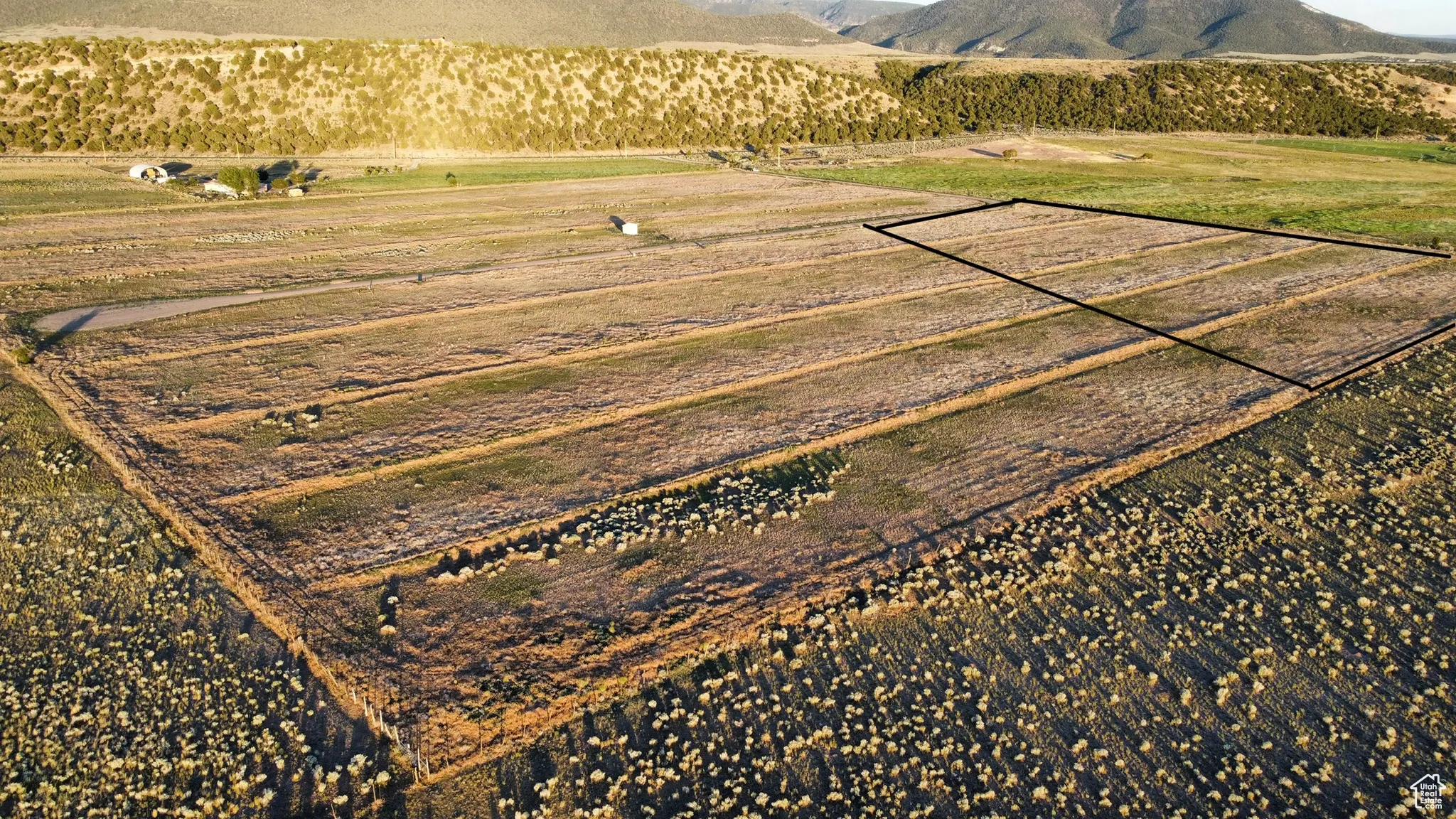 View of mountain background featuring rural landscape and abundant farmland