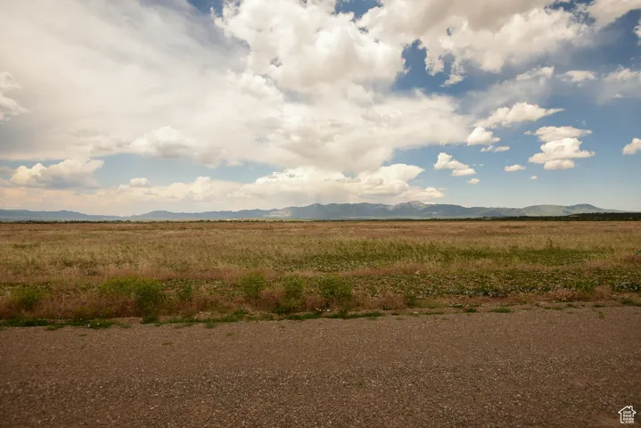 View of nature featuring rural landscape and a mountain backdrop