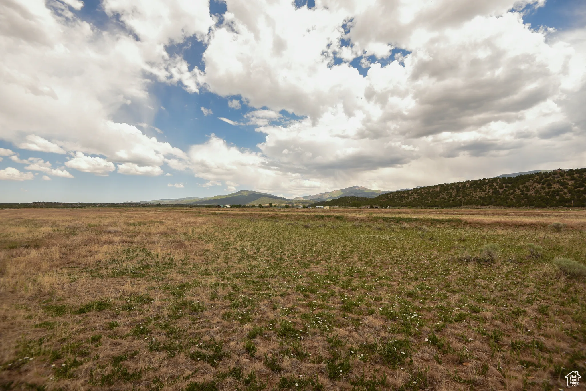 View of yard featuring a view of countryside and a mountain view