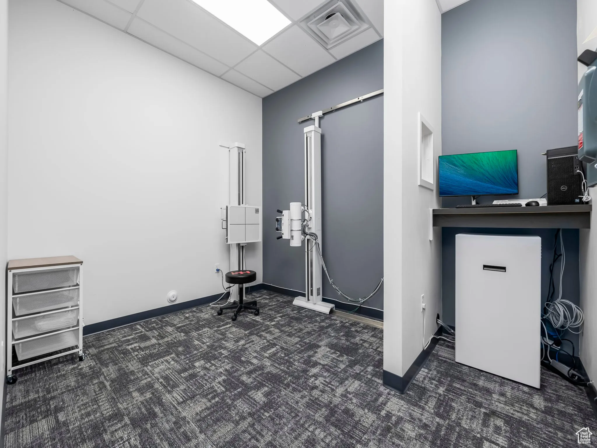Office space featuring a drop ceiling