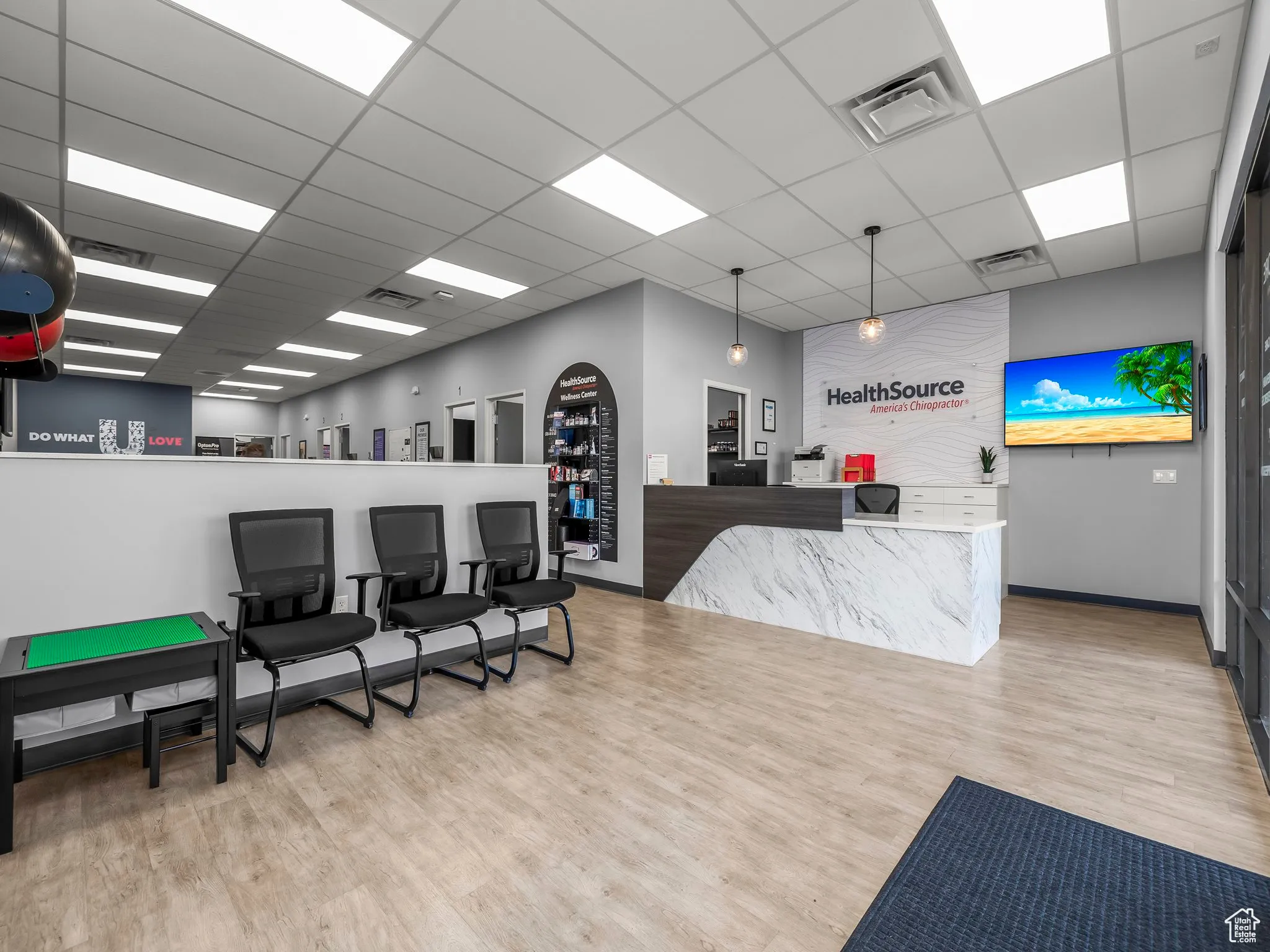 Reception featuring a drop ceiling