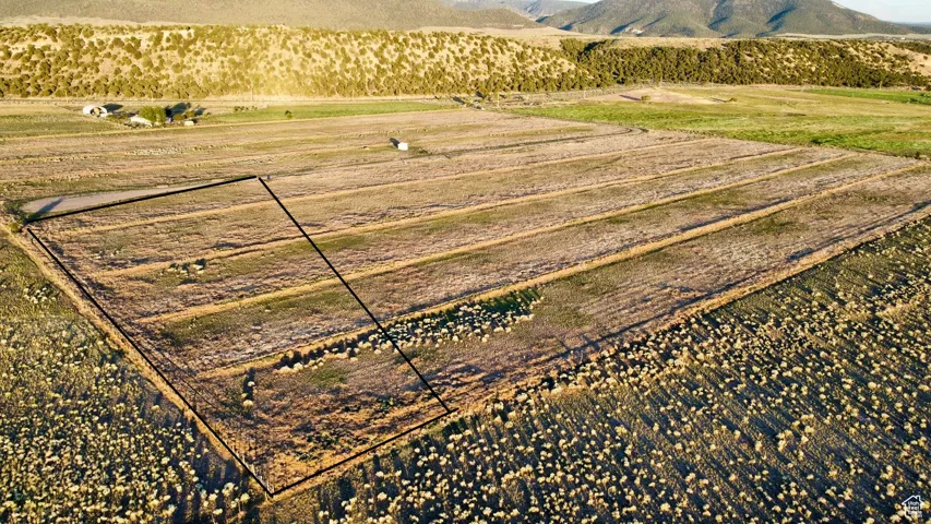 View of rural area featuring large plots for crops