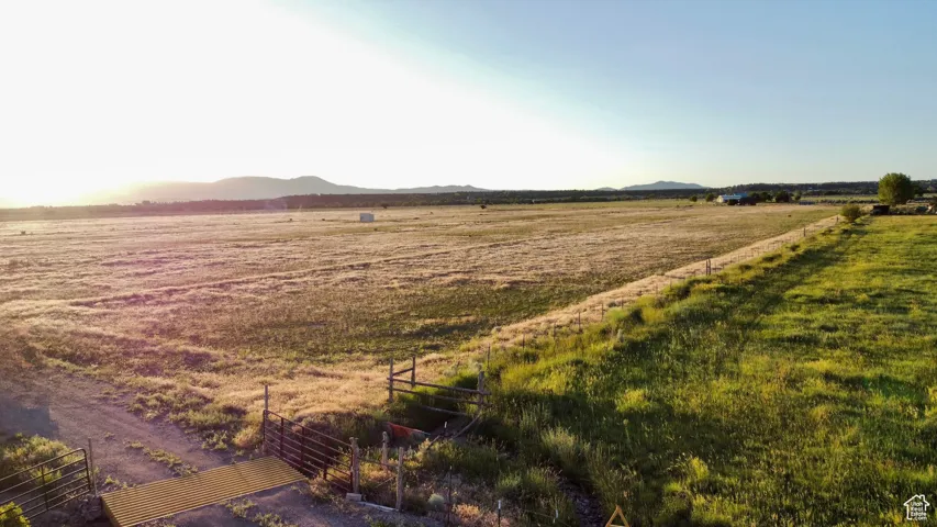 View of yard featuring a view of countryside and a mountain view