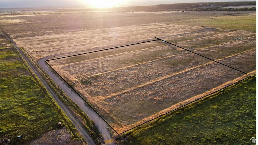 Aerial view of sparsely populated area featuring extensive farmland