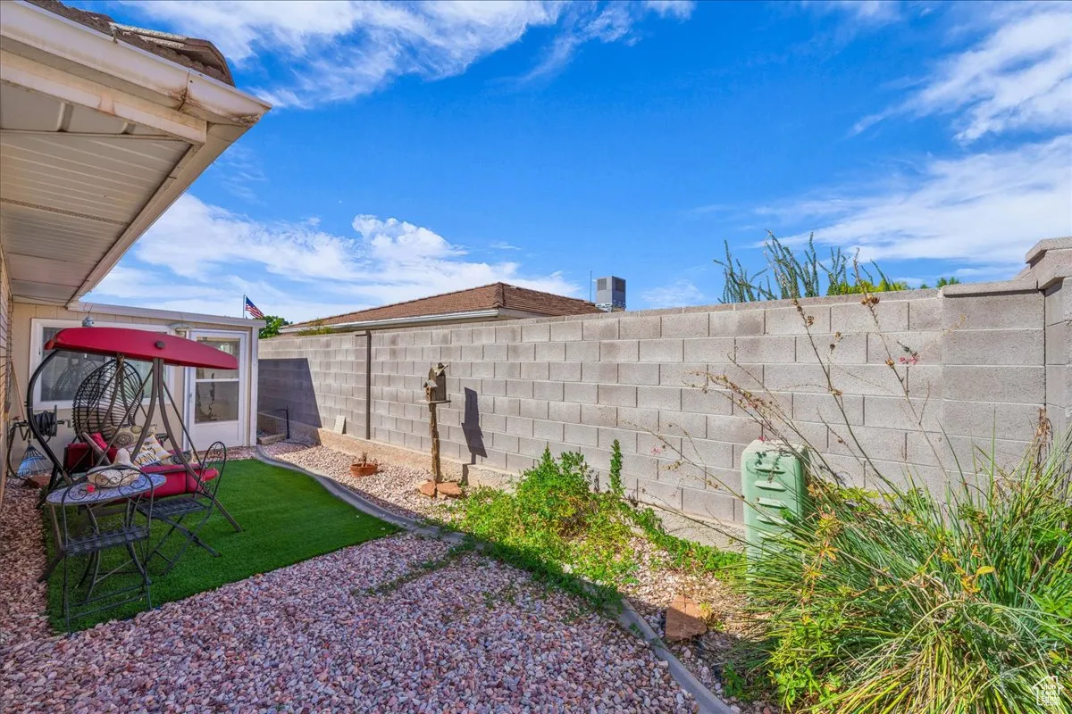 View of fenced backyard