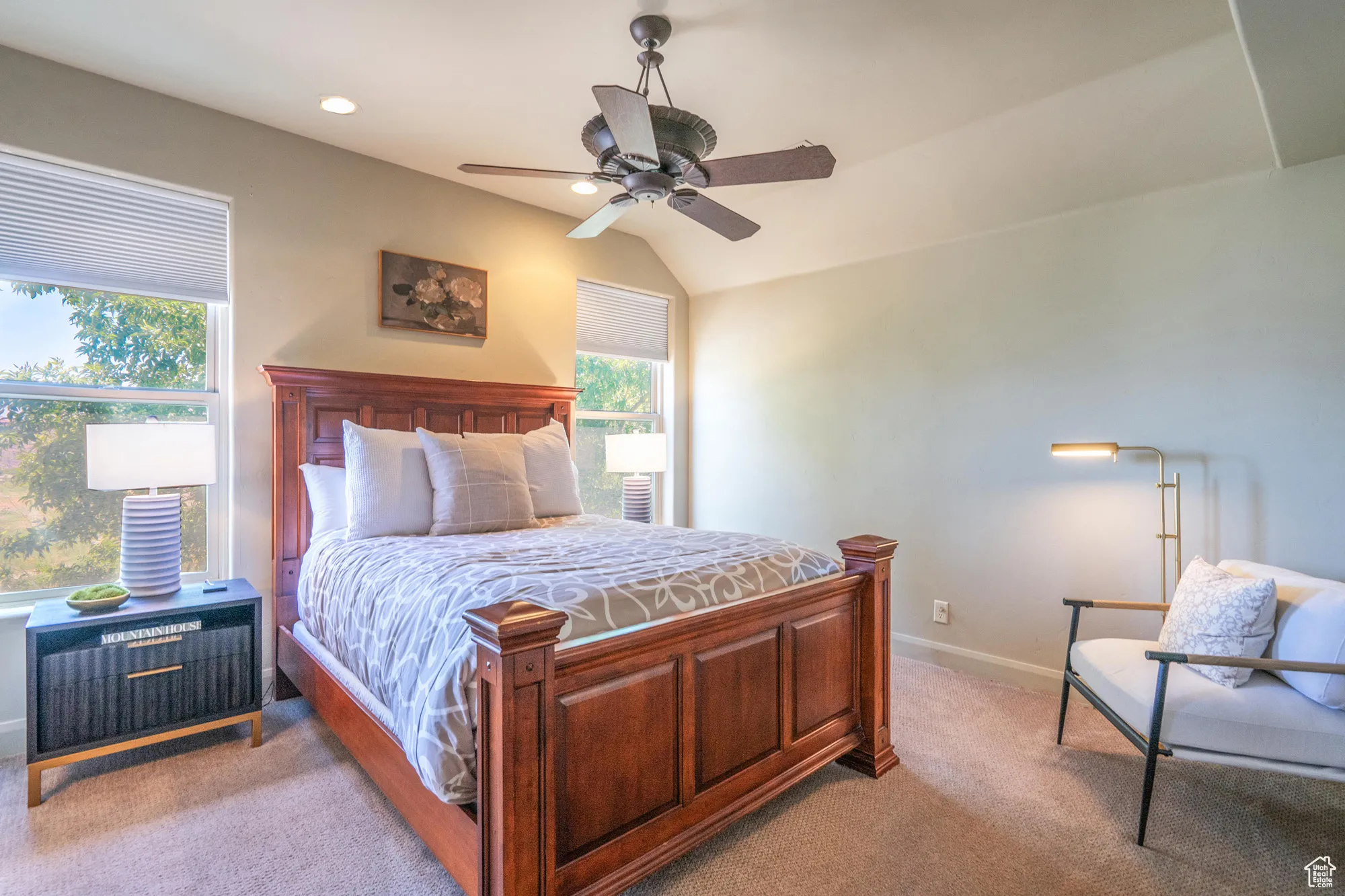 Bedroom with light carpet, a ceiling fan, recessed lighting, and lofted ceiling
