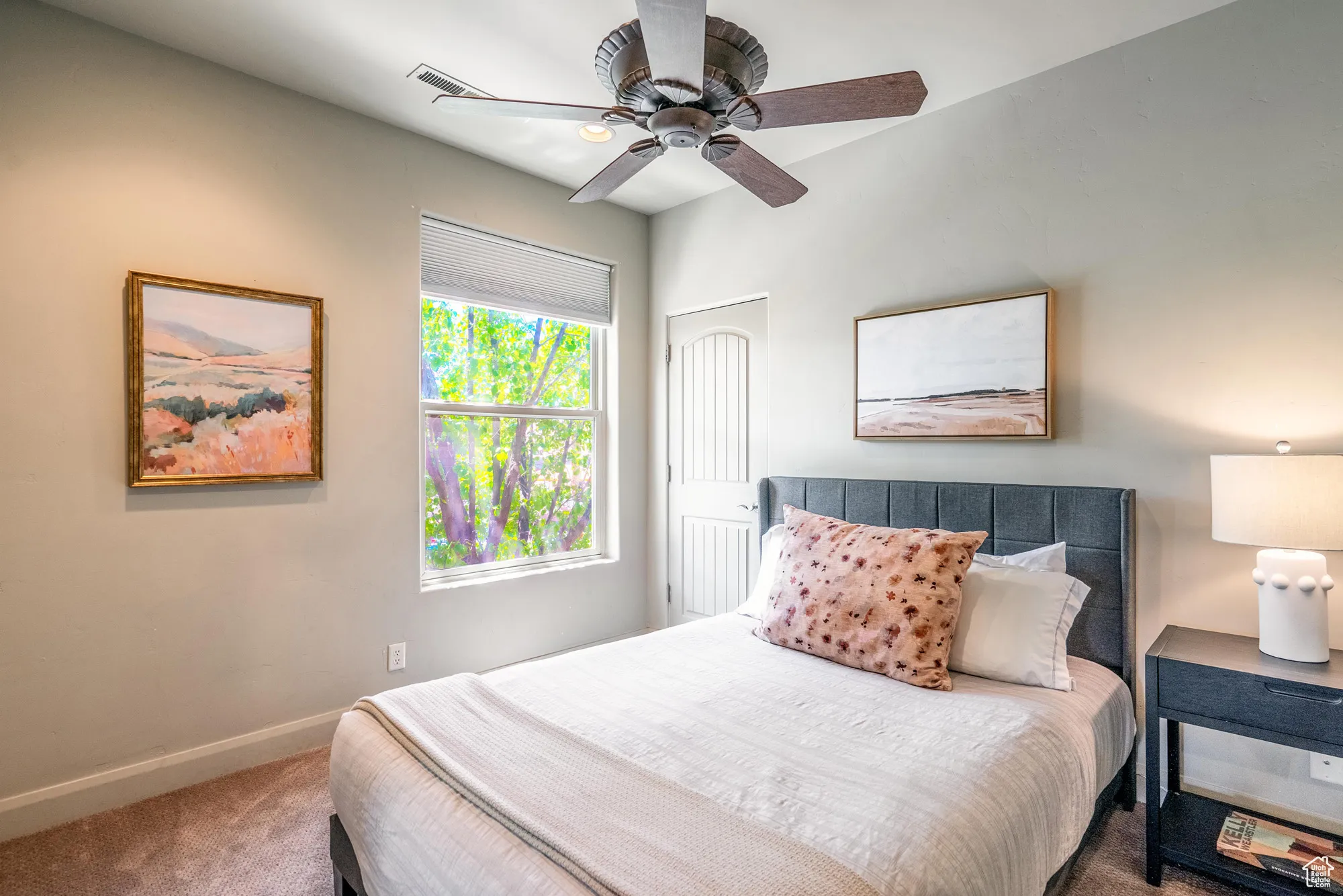 Bedroom featuring carpet flooring and ceiling fan
