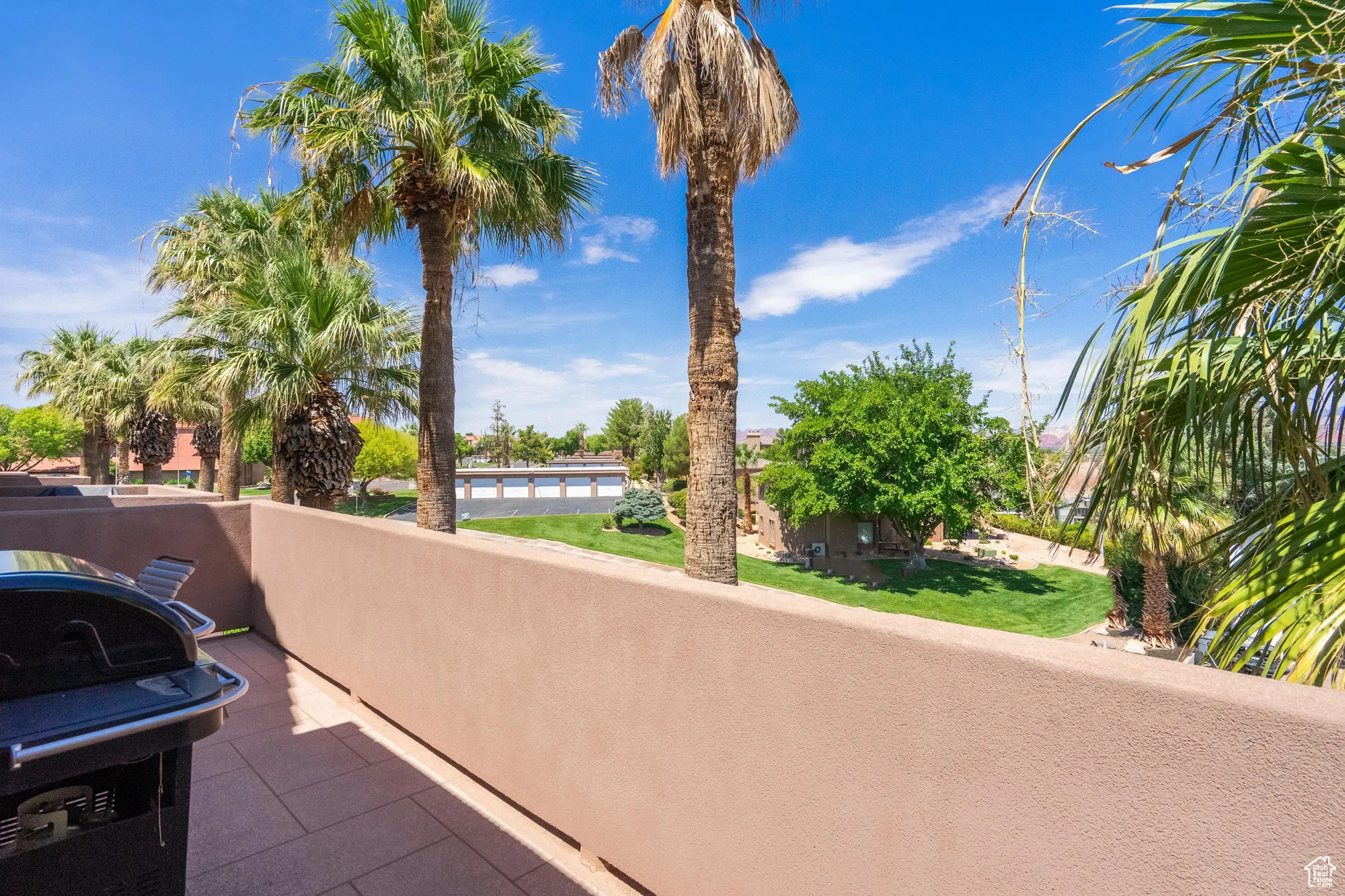 Patio / terrace with a grill