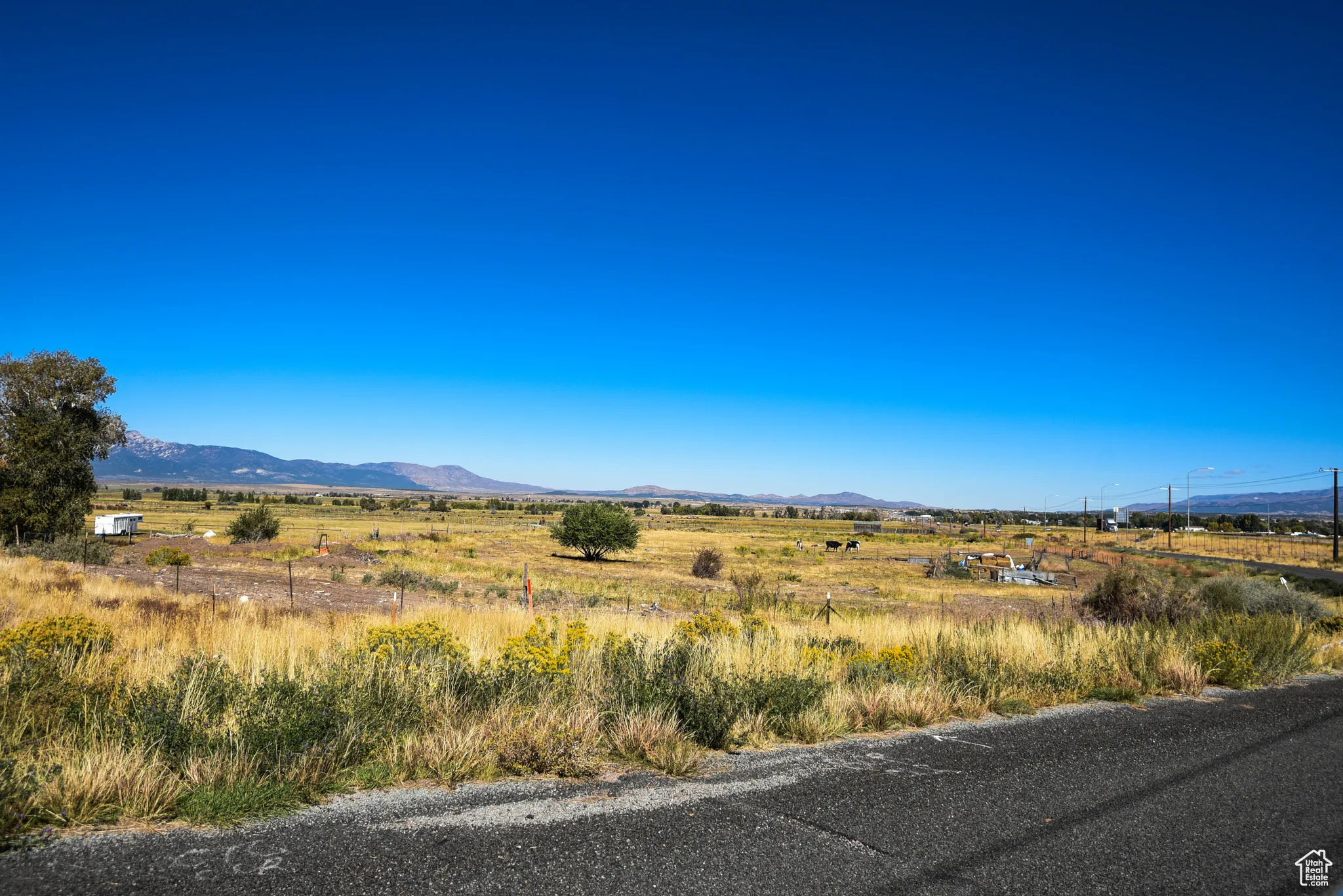 View of mountain background featuring rural landscape
