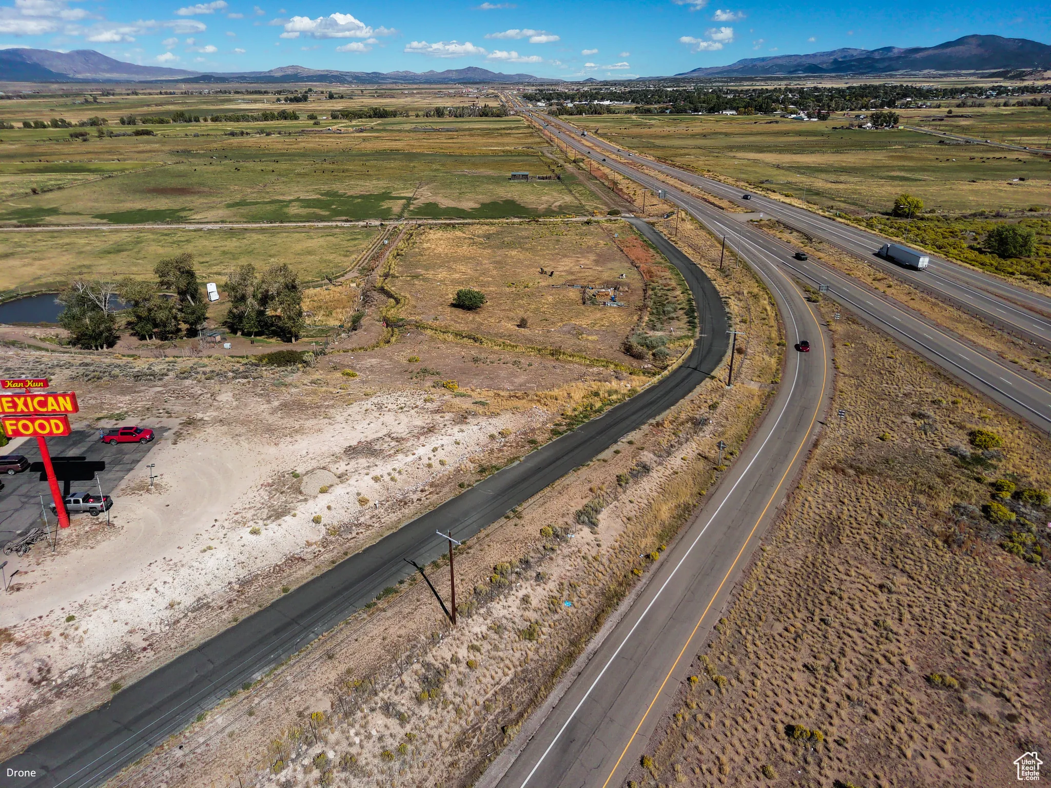 Aerial view of sparsely populated area with mountains