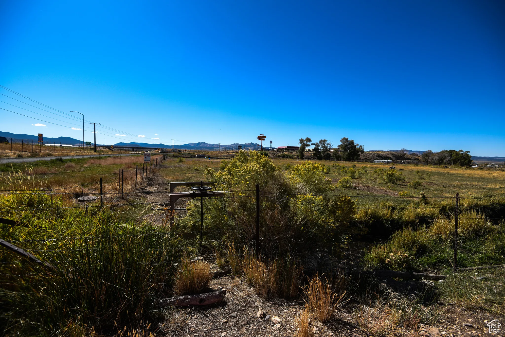 View of mountain background featuring rural landscape