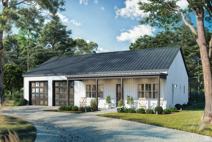 Modern farmhouse with covered porch, gravel driveway, a metal roof, and board and batten siding