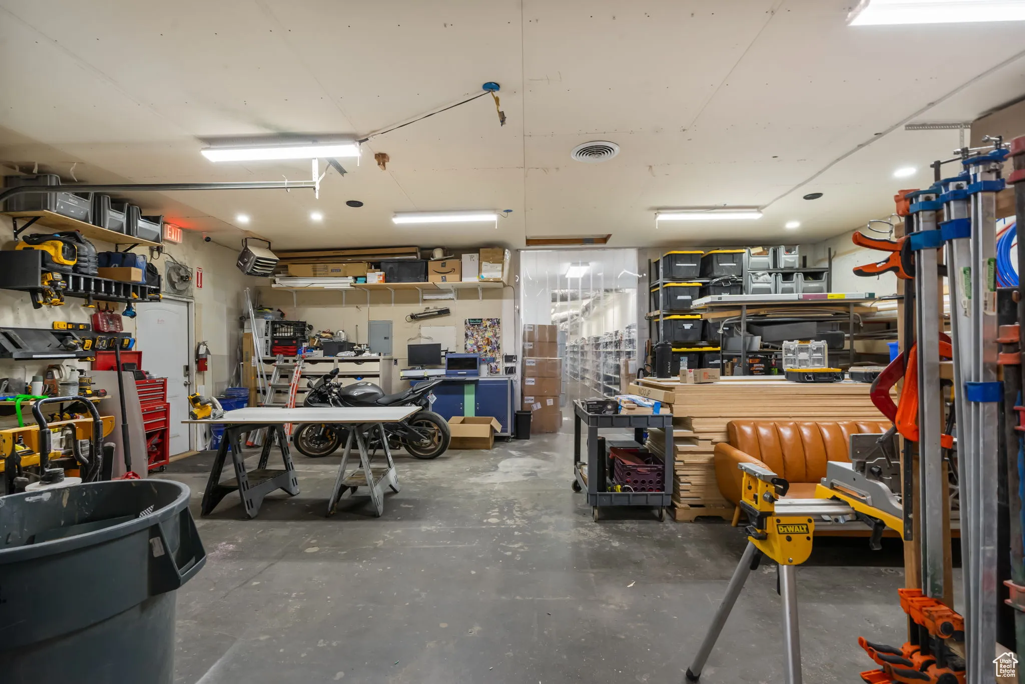 Garage featuring a workshop area