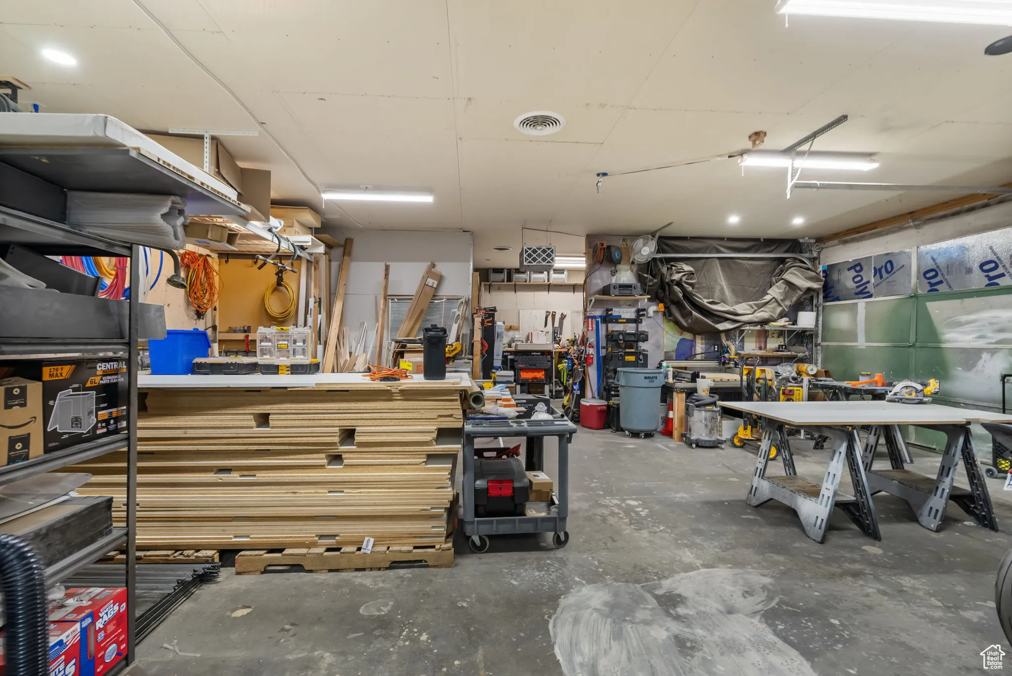 Garage featuring a workshop area