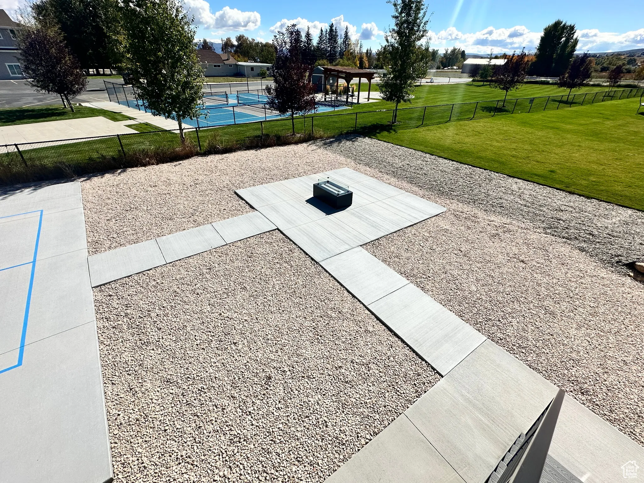 View of home's community with a patio