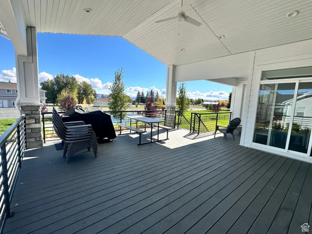 Wooden deck with a ceiling fan