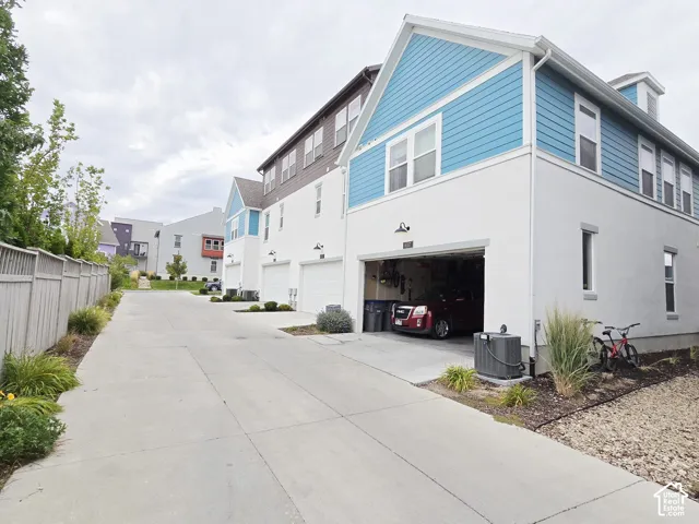 View of concrete road with a residential view