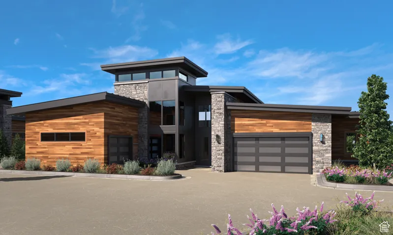 Contemporary home featuring stone siding and a garage