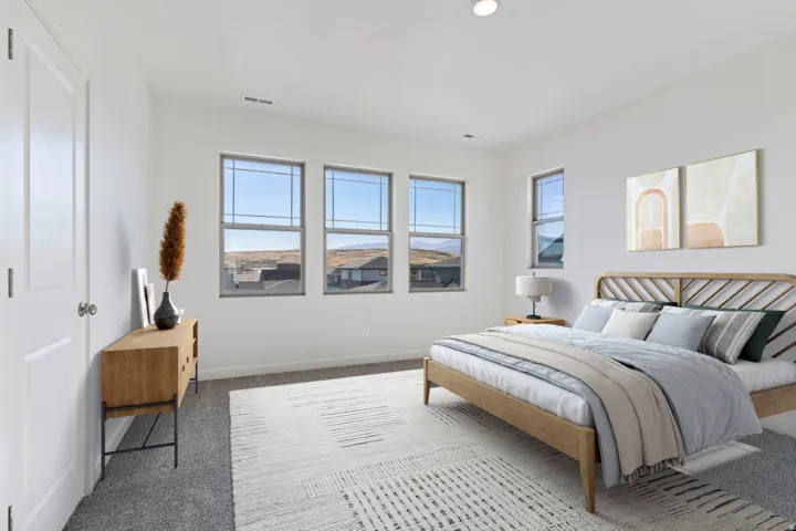 Carpeted bedroom with baseboards and recessed lighting