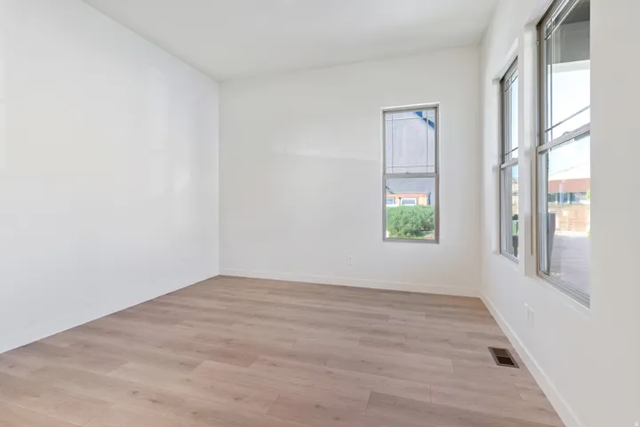 Spare room featuring light wood-style floors