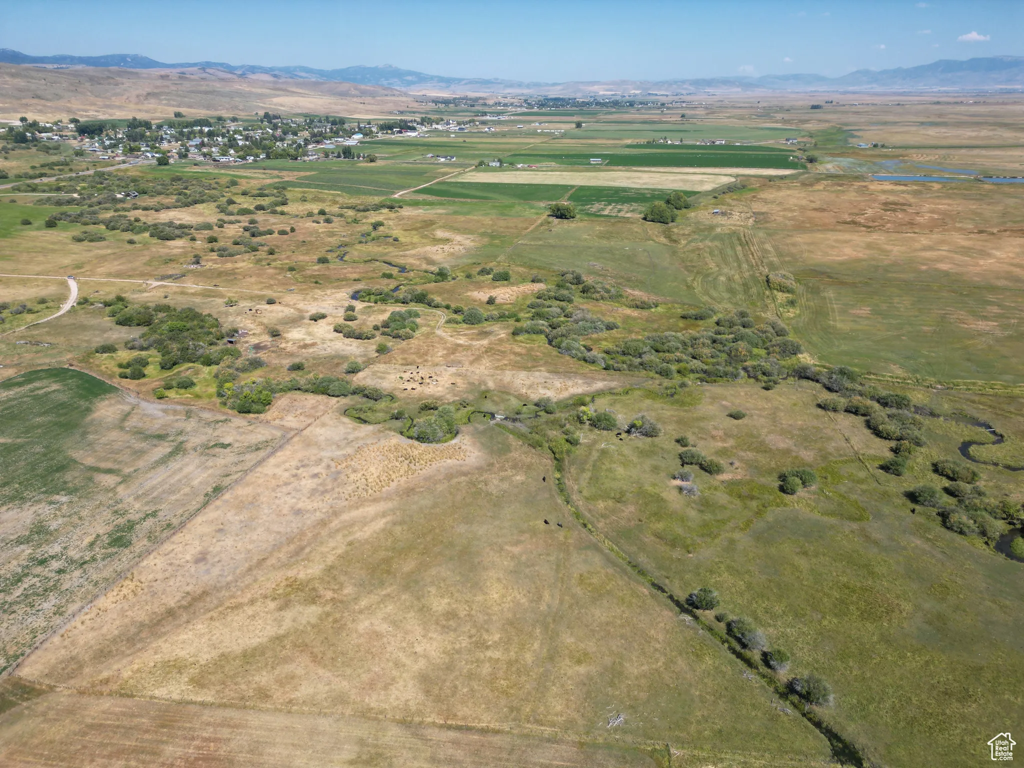 Bloomington 13 acres  Aerial overview of property's location with rural landscape and mountains