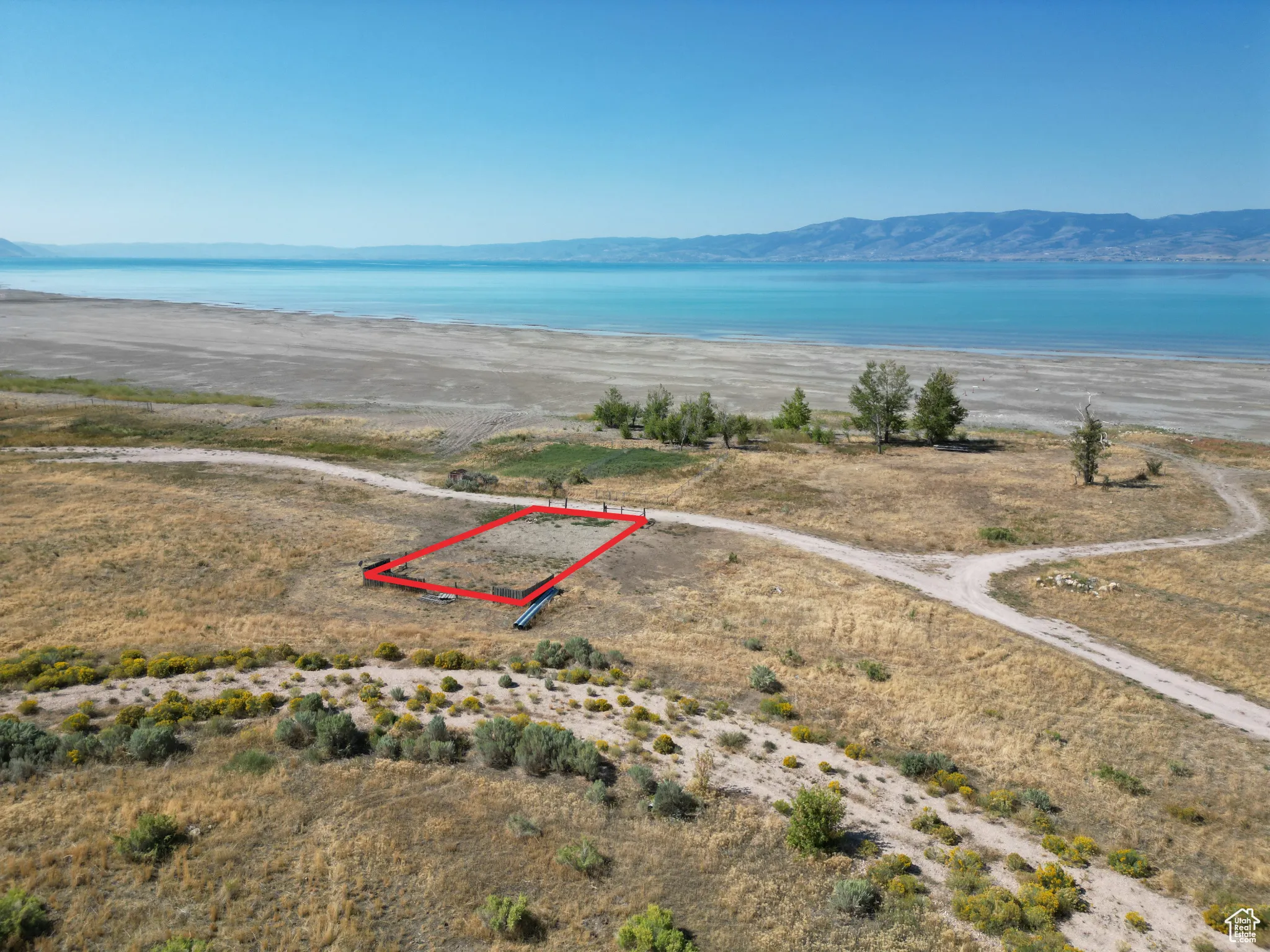 RV lot Aerial view of property's location featuring property just steps from Bear Lake sandy beaches