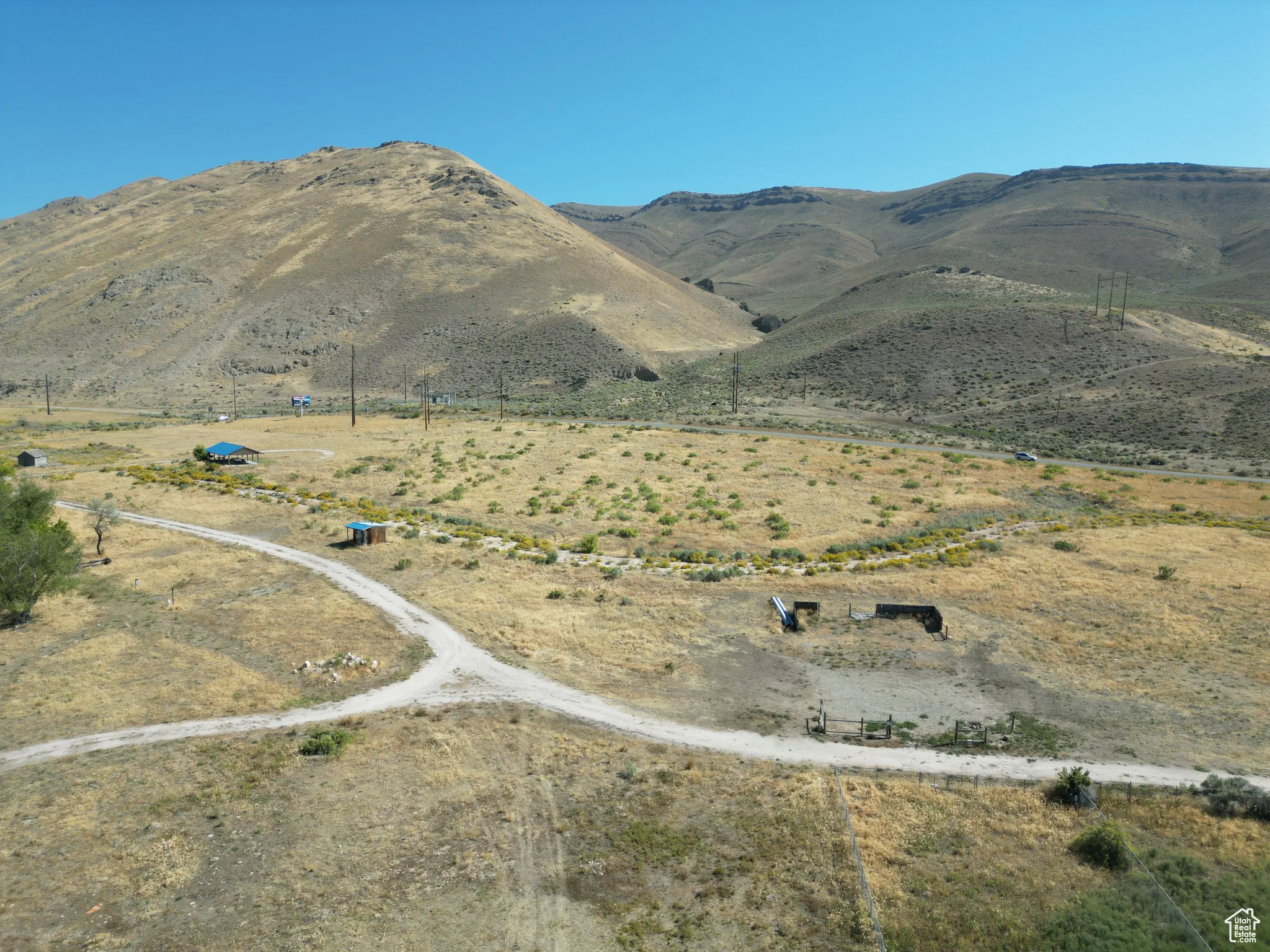 RV lot View of mountain backdrop featuring rural landscape