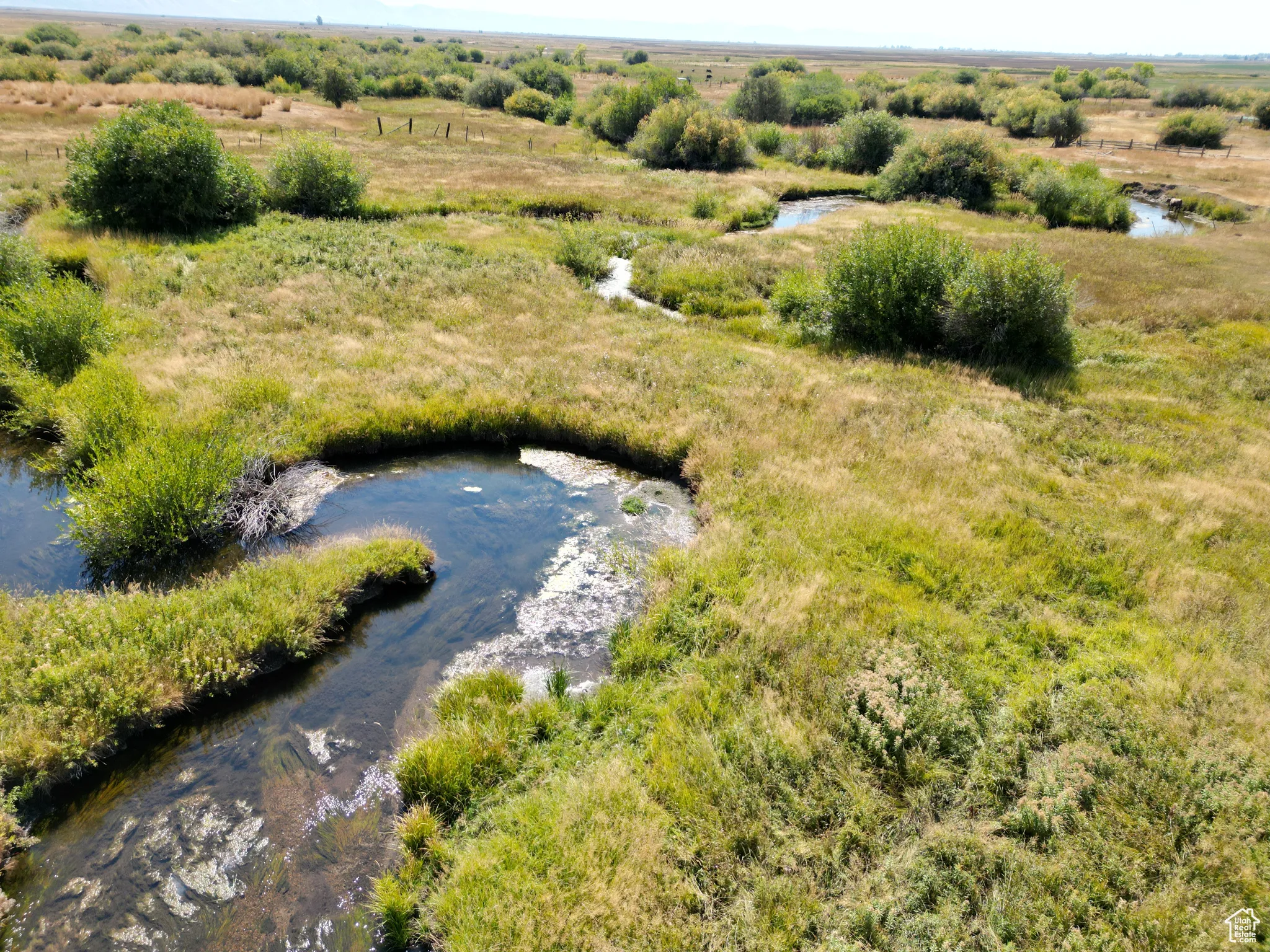 Bloomington 13 acres Overview of rural landscape with a creek
