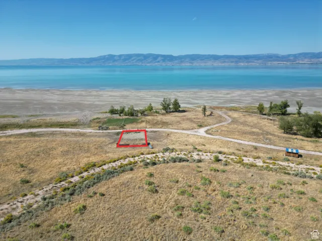 RV lot Aerial view of property and surrounding area featuring property parcel outlined with Bear Lake view