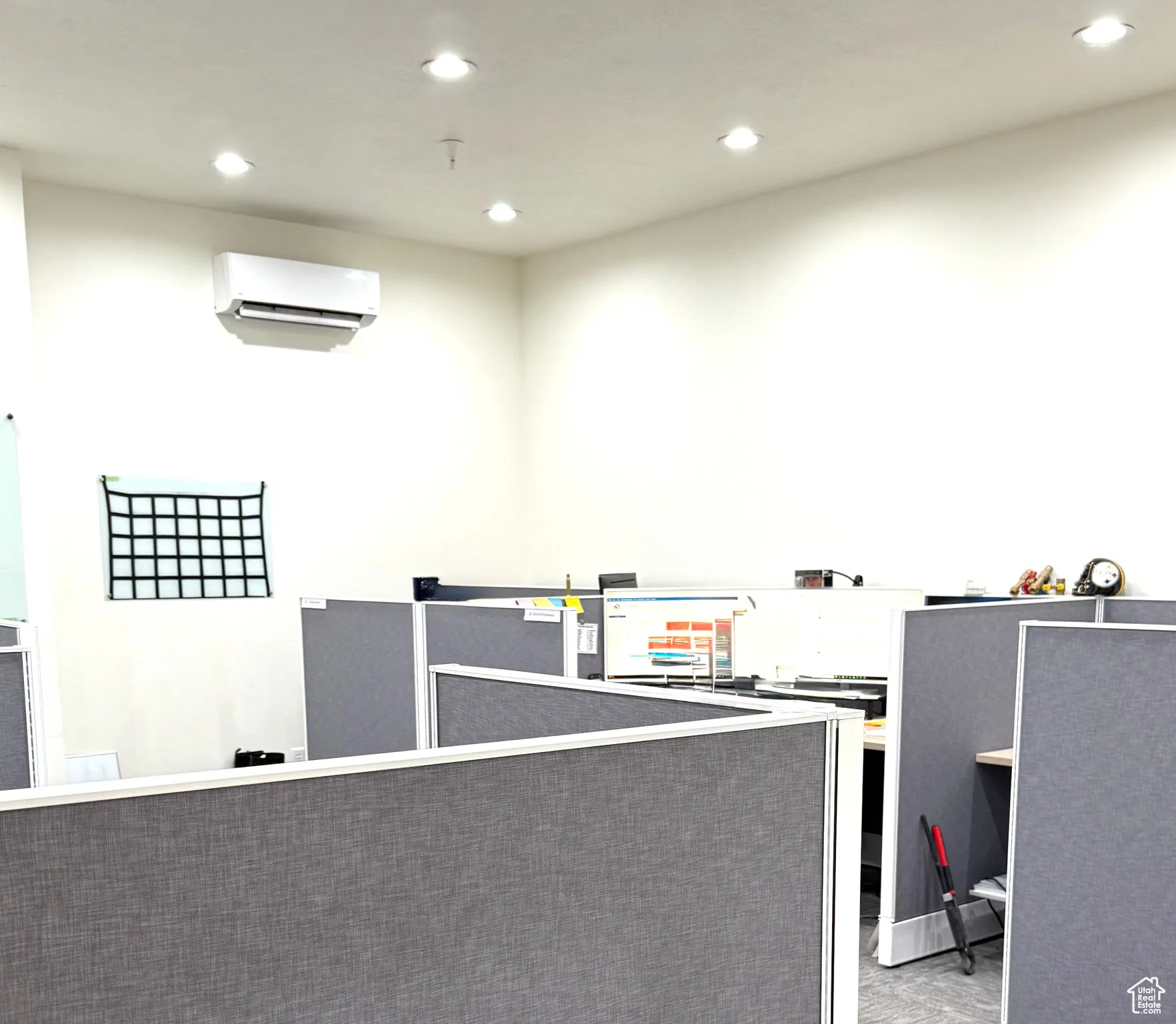 Interior space with pet washing station, recessed lighting, and a wall mounted air conditioner