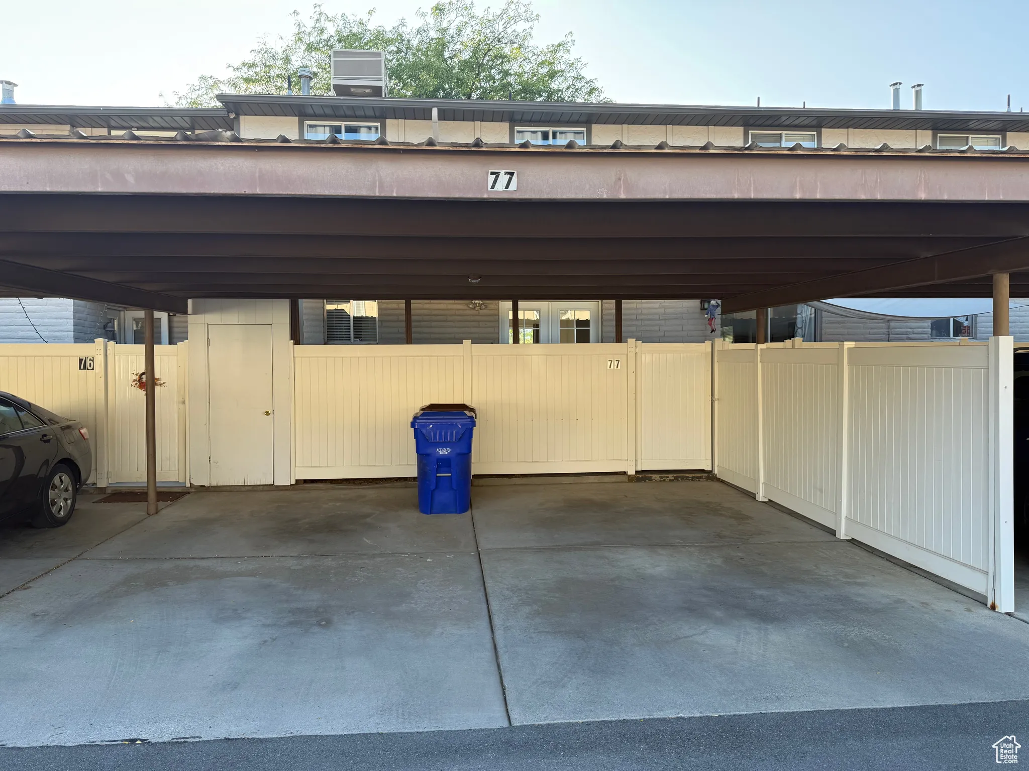 2 spaces of covered parking and storage shed for owner.