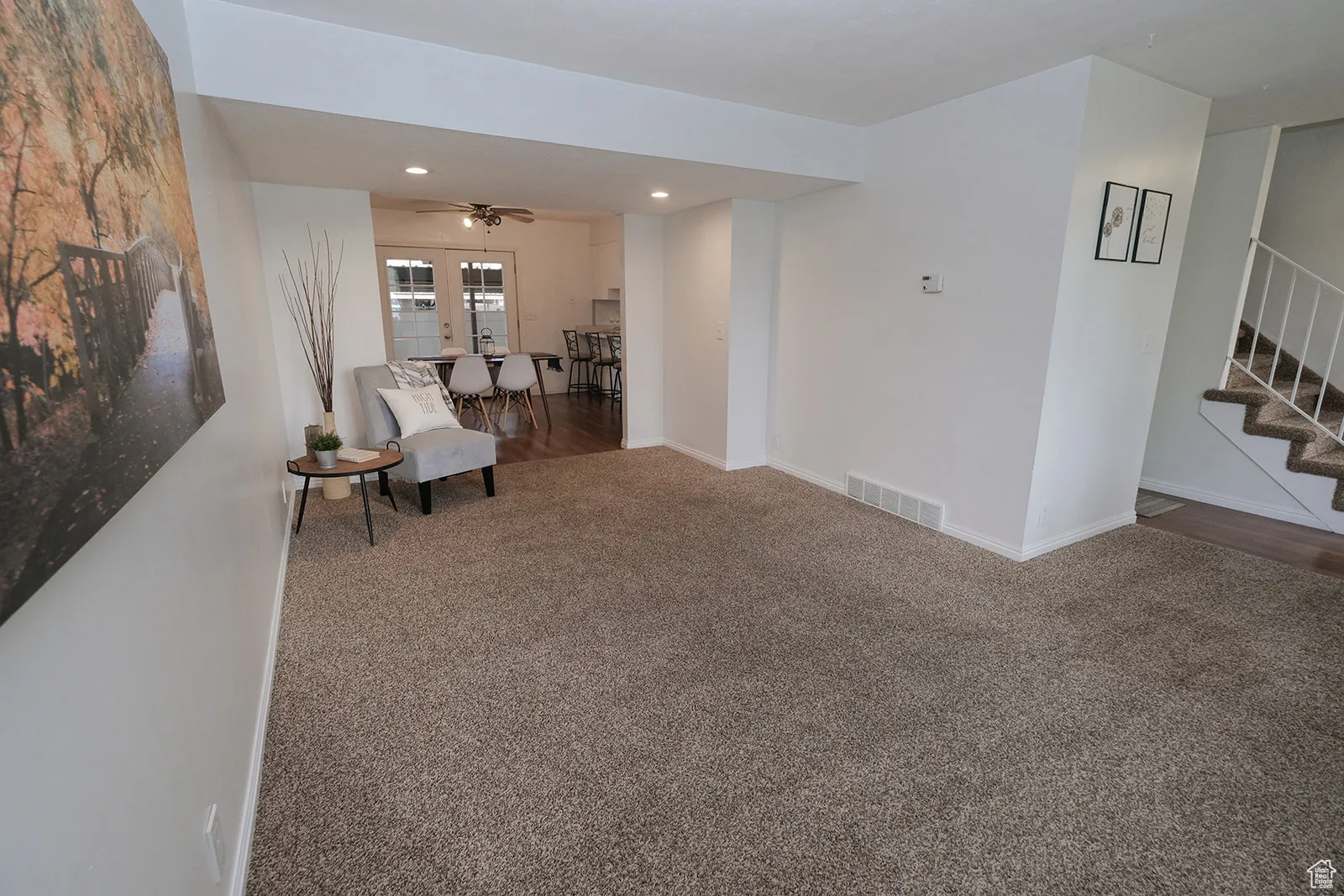 Sitting room with recessed lighting.